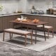 Backless bench with rubber wood legs and beige fabric padded seat, perfect for farmhouse-style dining rooms.