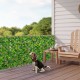 Expandable fence privacy screen with faux ivy leaves and real willow frame, ideal for balcony or yard privacy.
