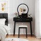 Black small vanity makeup dressing table set with cushioned stool and LED lighted mirror, perfect for compact bedrooms.