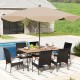 7-piece patio dining set featuring a rectangular acacia wood table and rattan armchairs with soft cushions, ideal for.