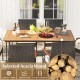 7-piece patio dining set featuring an acacia wood table and rattan armchairs with soft cushions, ideal for outdoor.