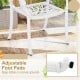 White cast aluminum dining chair with adjustable foot pads for stability on uneven surfaces, perfect for outdoor spaces.