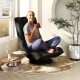 360° swivel gaming chair in black and gray with adjustable backrest, perfect for lounging in living rooms or game rooms.