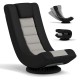360° swivel gaming chair in black and gray with adjustable backrest, perfect for lounging in game rooms or living.