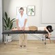 Professional massage bed with adjustable headrest and armrests, featuring a 3" thick cushion for comfort, ideal for.