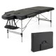 Professional 84-inch massage bed in black with adjustable headrest and carrying bag, ideal for therapists on the go.