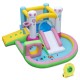 Colorful inflatable bounce house with slide, basketball hoop, and ball pit for outdoor fun and parties.