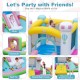 Inflatable bounce house with slide, ball pit, and basketball hoop for outdoor fun, made of durable waterproof material.