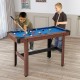 Kids playing on a 48-inch blue pool table with wooden frame, featuring a full set of balls for family fun.