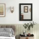 Rectangle black wood framed wall mirror with a chic patterned design, ideal for living room or entryway decor.