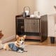 Indoor dog crate with removable tray, lockable door, and rustic wood-like finish, serving as an end table.