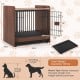 Dog crate with removable tray, lockable door, and rustic wood-like finish, perfect for indoor use as an end table.