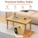 Patio coffee table with solid teak wood and slatted tabletop, ideal for indoor and outdoor use.