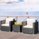 Two-piece patio wicker furniture set with white cushions and a glass-top table, perfect for outdoor relaxation.