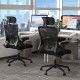 Ergonomic mesh office chair with lumbar support, adjustable headrest, and armrests, designed for comfort in a modern.