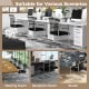 Set of 4 black office guest chairs with metal sled base, armrests, and ergonomic design for versatile meeting spaces.