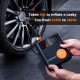Jump starter with air compressor showing digital display, inflating a tire from 32PSI to 36PSI for emergency use.