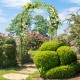 Metal garden arch backdrop stand with climbing plant trellis, featuring an elegant arched design for outdoor.