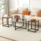 Round coffee table with two square end tables in gray, featuring a textured surface and sturdy metal frame for.