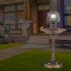 Pedestal bird bath with solar light in bronze, featuring a bird feeder and flower planter for outdoor gardens.