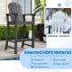 Counter height outdoor HDPE bar stool in black with armrests and footrest, designed for comfort and weather resistance.
