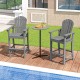 Counter height gray HDPE bar stools with armrests and footrest, perfect for outdoor relaxation by the pool.