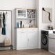Double tilt-out trash cabinet with hutch, rubberwood countertop, and tempered glass doors for organized storage.