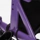 Close-up of the purple frame of a height adjustable rollator walker, featuring durable construction and ergonomic.