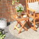 Compact 14-inch folding side table with slatted tabletop, perfect for backyard or living room use.