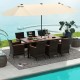 10-piece outdoor dining set featuring a beige double-sided umbrella, rattan chairs, and acacia wood tabletop for.
