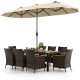 10-piece outdoor dining set featuring a large beige patio umbrella, rattan chairs, and acacia wood tabletop for.