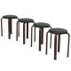 Set of 4 stackable bentwood round stools with padded black seats, ideal for dining and space-saving storage.