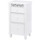White wooden storage cabinet with three drawers and carved accents, perfect for organizing essentials in any room.