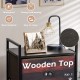 Industrial storage dresser with wooden top, 4 fabric drawers, and steel frame, perfect for bedroom or living room use.