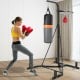 Heavy duty boxing punching stand with a heavy bag and speed bag, ideal for home gym strength training.