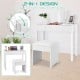 Vanity makeup dressing table set in white with flip-top mirror, cushioned stool, and ample storage for cosmetics.