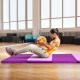 Folding gymnastics mat in pink, 4' x 8', featuring high-density foam and portable handles for easy transport and.