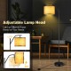 Standing floor lamp with adjustable beige fabric shade and matte black iron frame, ideal for living room or bedroom.