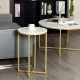 Round side table with faux marble top and golden metal legs, ideal for living room or small spaces.