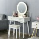 Vanity dressing table set with LED mirror, two drawers, and comfortable stool, perfect for modern bedroom decor.