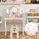 Kids vanity set with tri-fold mirror, white finish, includes chair and storage for makeup and accessories.