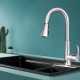 Brushed metal touchless kitchen faucet with 360° swivel, single handle, and pull-out sprayer for versatile cleaning.