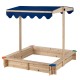 Kids wooden sandbox with raised bench seating and waterproof blue canopy, perfect for outdoor play and socializing.