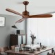 52-inch modern ceiling fan with solid wood blades and brushed nickel finish, ideal for indoor dining room use.