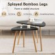 Nesting coffee tables with triangular tabletops and bamboo legs, perfect for versatile living room arrangements.