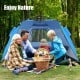 Family enjoying a picnic inside a blue Easy Pop Up Beach Tent with UPF 50+ sun protection, perfect for summer outings.