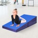 Child performing a yoga pose on a blue tumbling incline gymnastics folding wedge ramp mat for safe exercise.