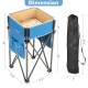 Folding camping table with large storage sink, blue fabric, durable steel frame, ideal for outdoor activities.