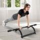 Multi-Grip Doorway Pull Up Bar with foam grips, shown in use for push-ups, ideal for home workouts and fitness.