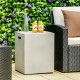 Gray propane tank cover hideaway table with drinks, perfect for outdoor patios and easy to move with side handles.